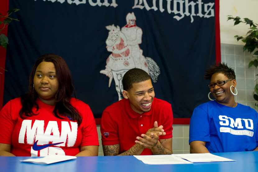 High school basketball star Keith Frazier signs to play for SMU at Kimball High School in...