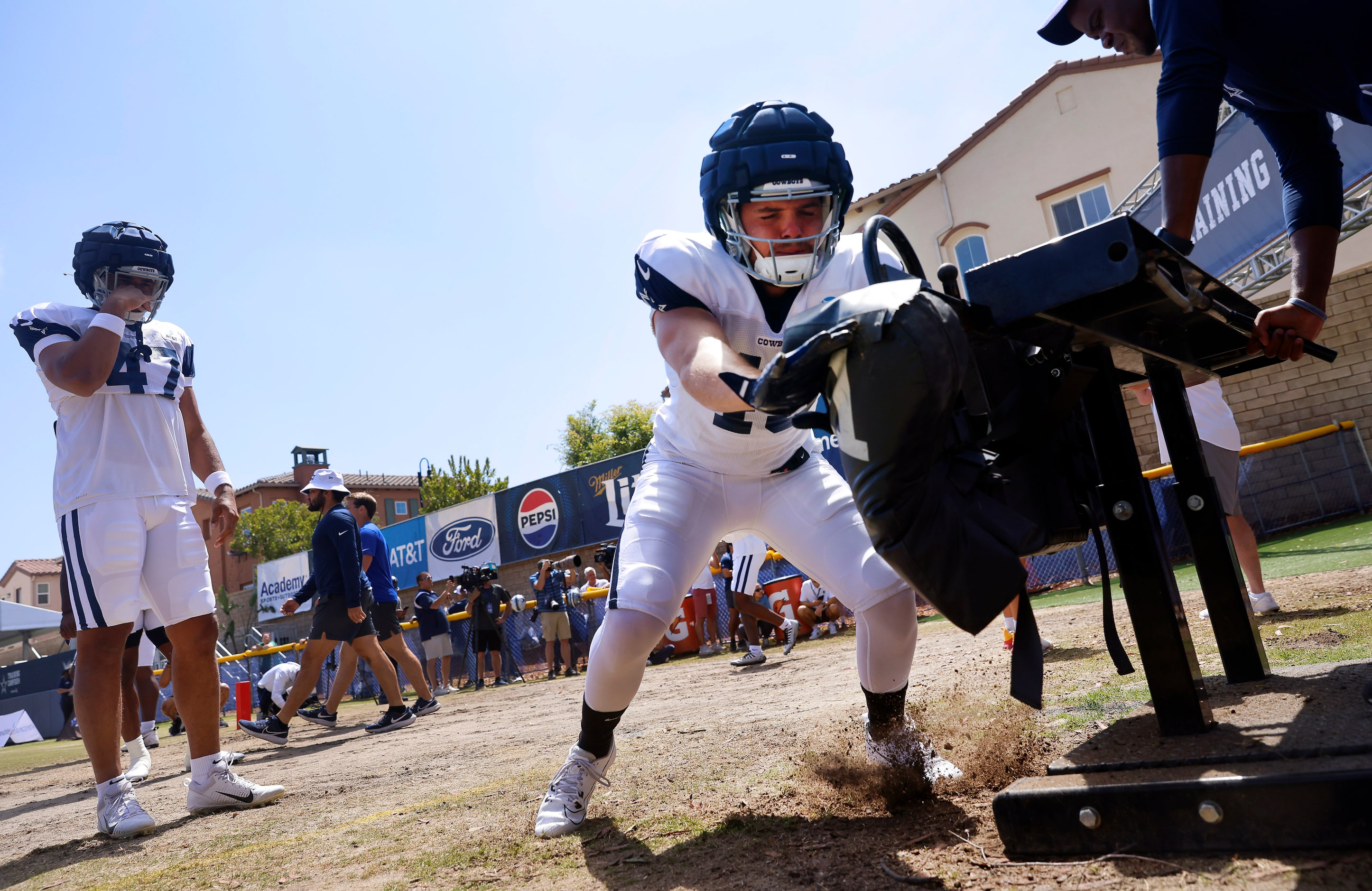 Dallas Cowboys tight end Alec Holler (49) works on his blocking skills before training camp...