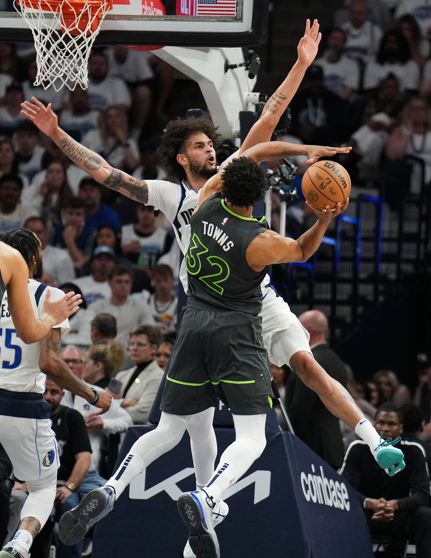 Dallas Mavericks center Dereck Lively II (2) defends against Minnesota Timberwolves center...