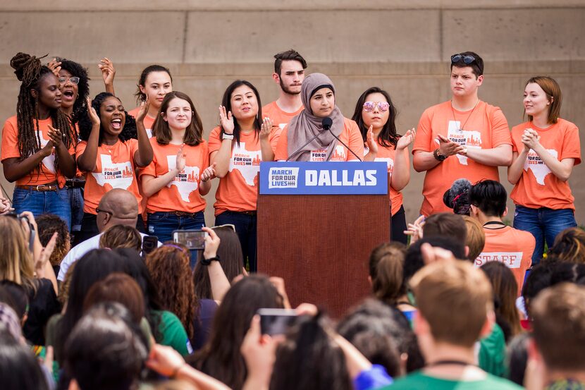 Waed Alhayek, 19, a student at UT-Arlington, addresses the rally at City Hall. "This is a...