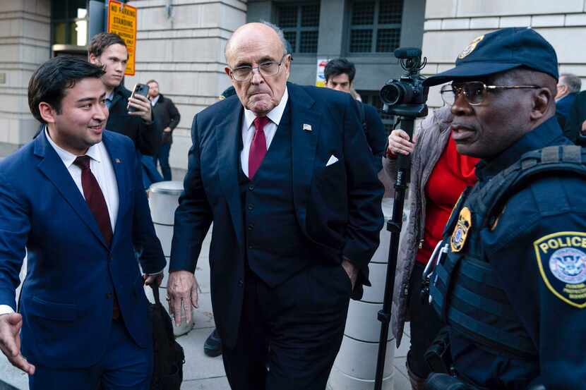 Former Mayor of New York Rudy Giuliani leaves the federal courthouse in Washington on Friday.