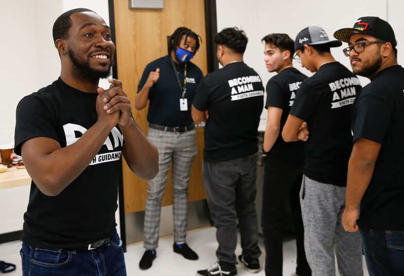 Becoming a Man (BAM) youth specialist Travis Mason (left) and Michael Anderson, Dallas’ BAM...