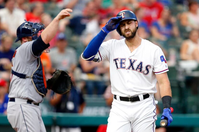 With bases loaded, Texas Rangers batter Joey Gallo strikes out in the third inning against...