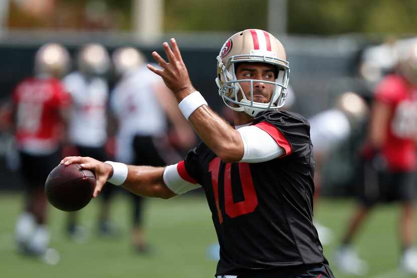 San Francisco 49ers quarterback Jimmy Garoppolo (10) throws a pass during practice at the...