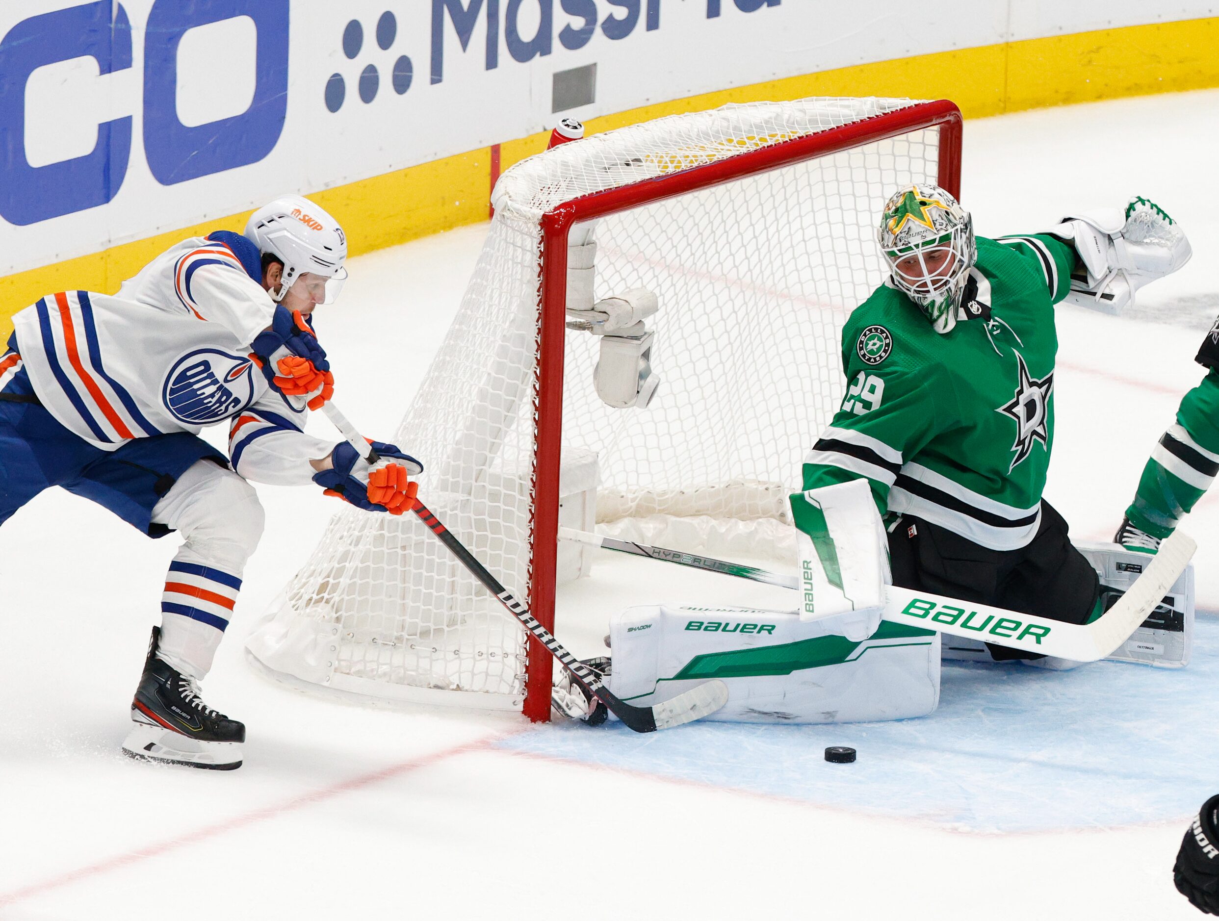 Dallas Stars goaltender Jake Oettinger (29) makes a save against Edmonton Oilers center...