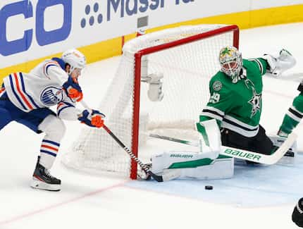 Dallas Stars goaltender Jake Oettinger (29) makes a save against Edmonton Oilers center...