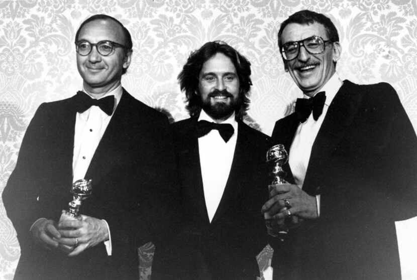 In this Jan. 29, 1978, file photo Neil Simon, Michael Douglas and Herbert Ross pose after...