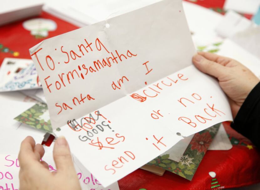 Santa's friends in the U.S. Postal Service's Dallas district answer more than 5,000 letters...