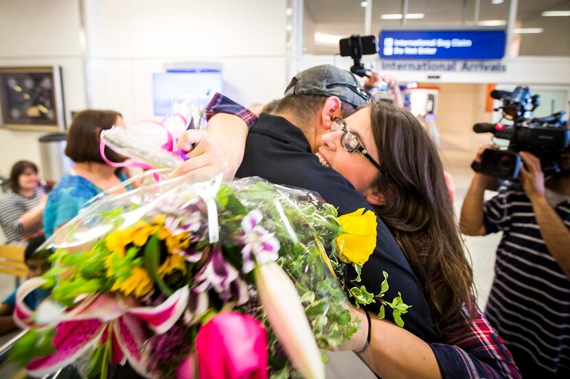 
Danielle Banks hugs her boyfriend Luke Burleson.
