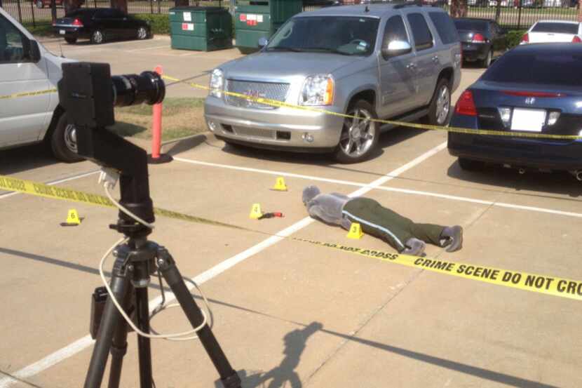 The Garland Police Department's Panoscan scans a fake crime scene set up by forensics...
