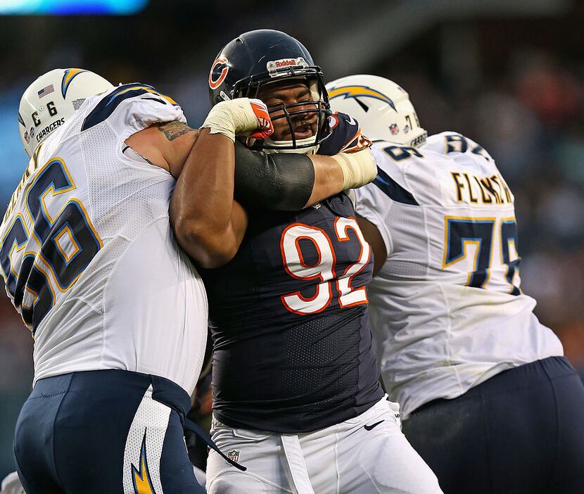 CHICAGO, IL - AUGUST 15: Stephen Paea #92 of the Chicago Bears rushes against Jeromey Clay...