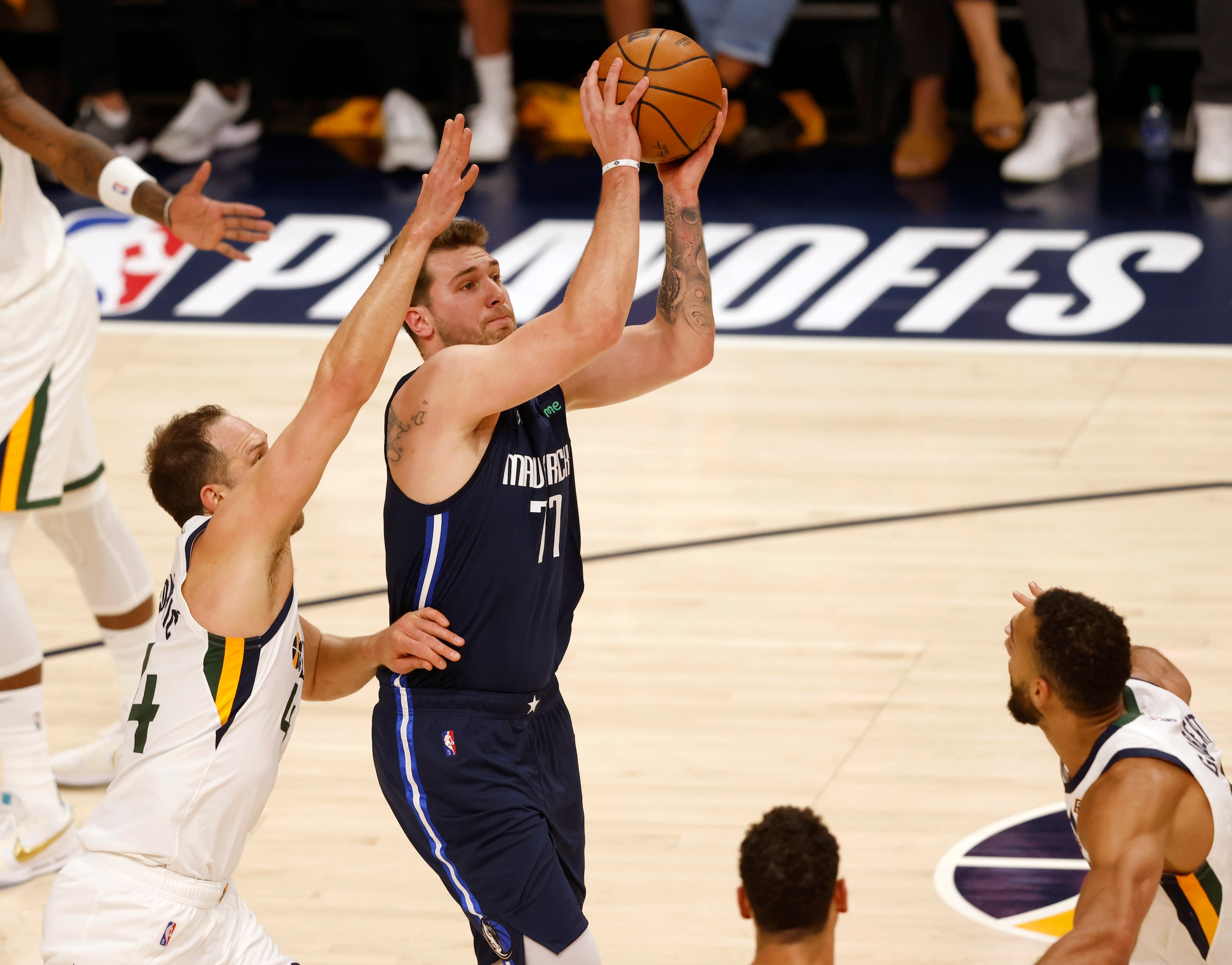 Dallas Mavericks guard Luka Doncic (77) attempts a shot in between Utah Jazz forward Bojan...