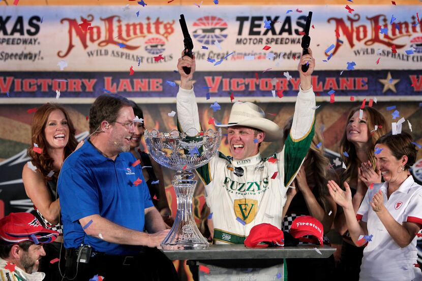 Ed Carpenter in the number 20 Fuzzy's Vodka Chevrolet celebrates winning the Verizon IndyCar...