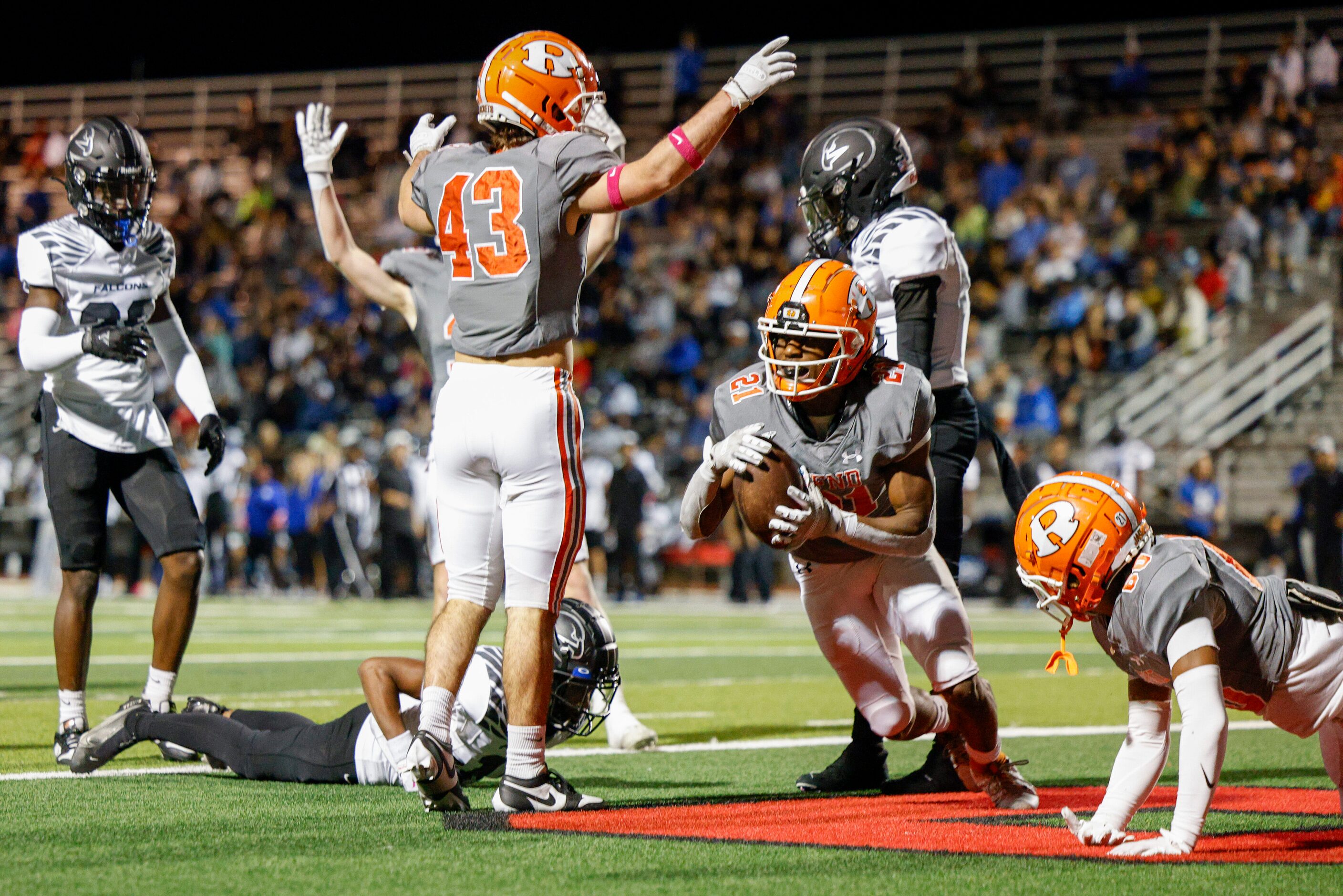 Rockwall running back Jamir Wilson (21) recovers a fumble in the end zone during a kickoff...