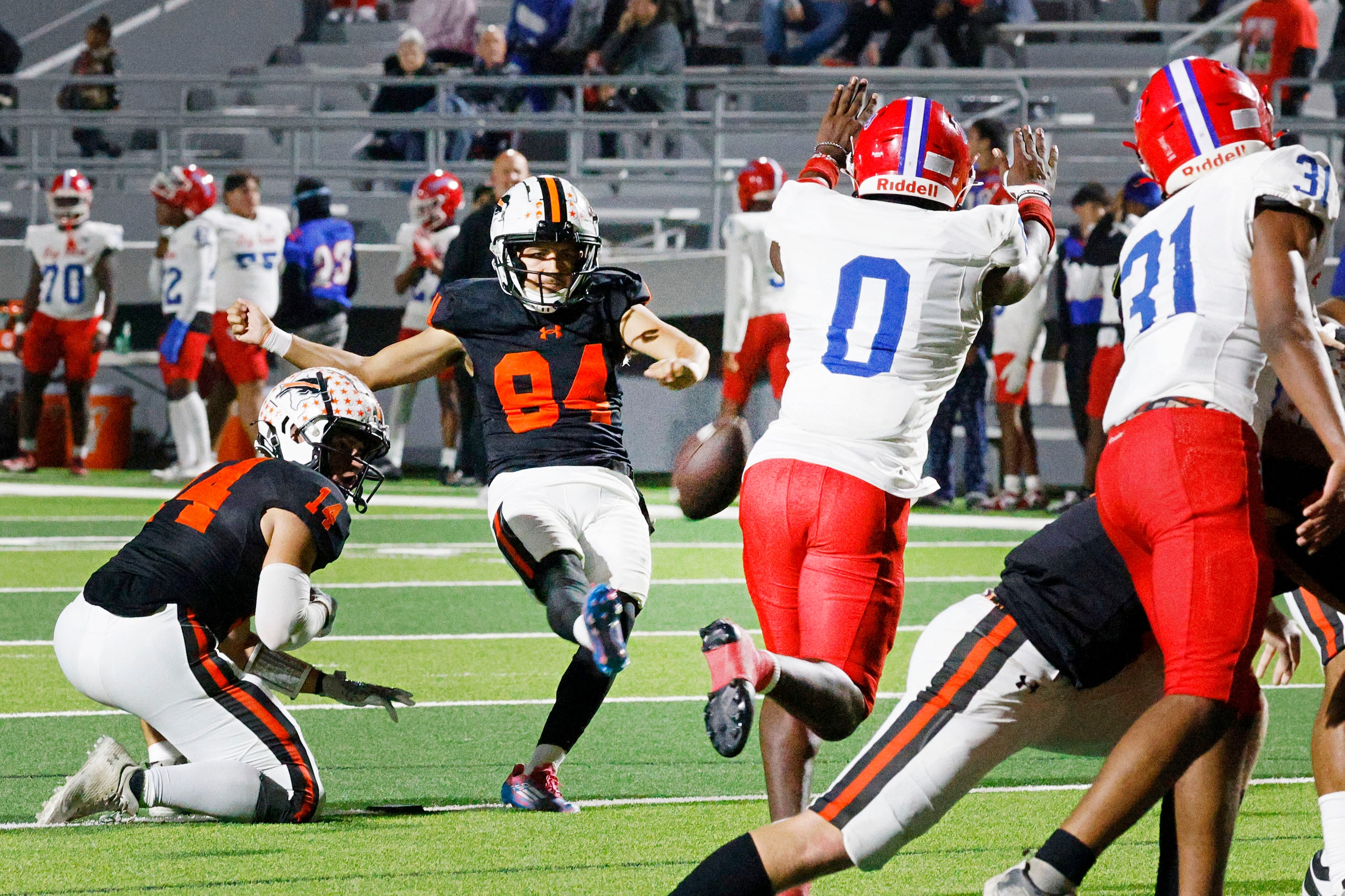 Haltom's Saul Segovia (84) scores a field goal against Sam Houston in the first half of a...