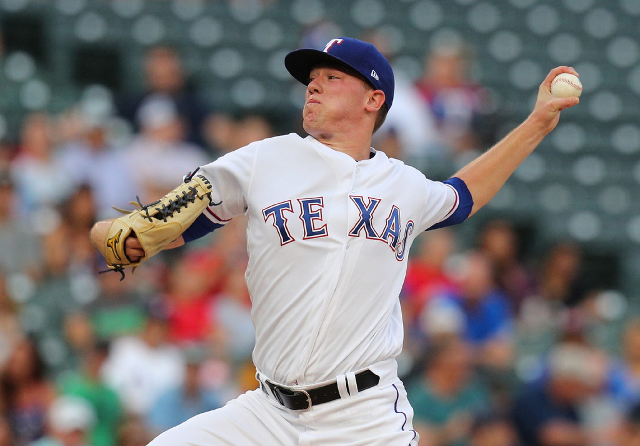 ARLINGTON, TEXAS - AUGUST 30: Kolby Allard #39 of the Texas Rangers delivers a pitch against...