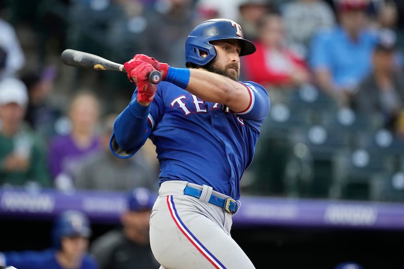 Texas Rangers' Joey Gallo grounds into a fielder's choice in the fourth inning of a baseball...