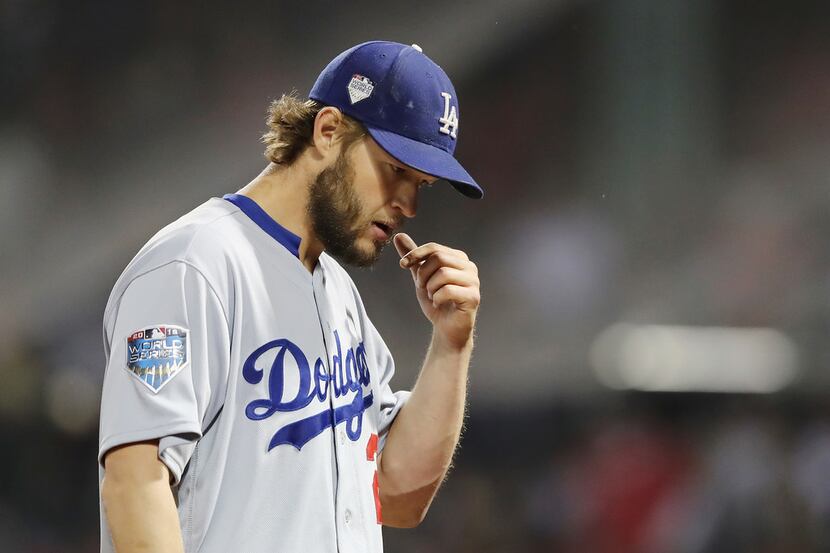 BOSTON, MA - OCTOBER 23:  Clayton Kershaw #22 of the Los Angeles Dodgers reacts as he is...