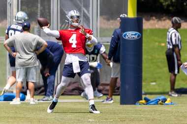 Dallas Cowboys quarterback Dak Prescott throws during practice at The Star in Frisco,...