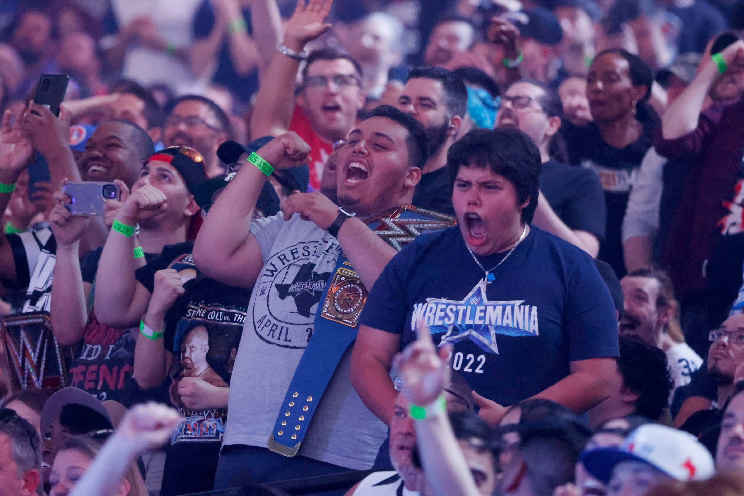 Fans cheer during WrestleMania in Arlington, Texas on Saturday, April 2, 2022. 