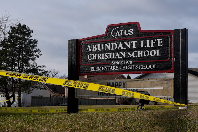 Police tape is seen outside the Abundant Life Christian School Tuesday, Dec. 17, 2024 in...