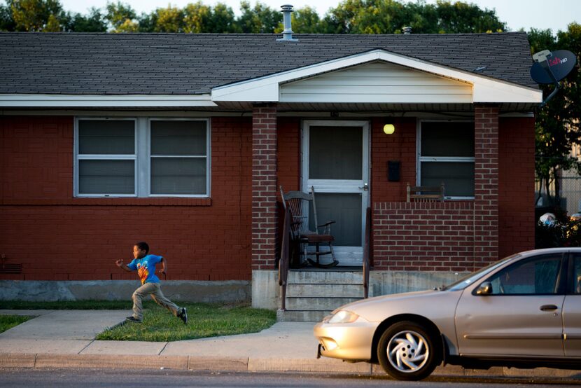 Kids run on the sidewalk at Merritt Homes on Oct. 6, 2016 in McKinney, Texas. (Ting Shen/The...