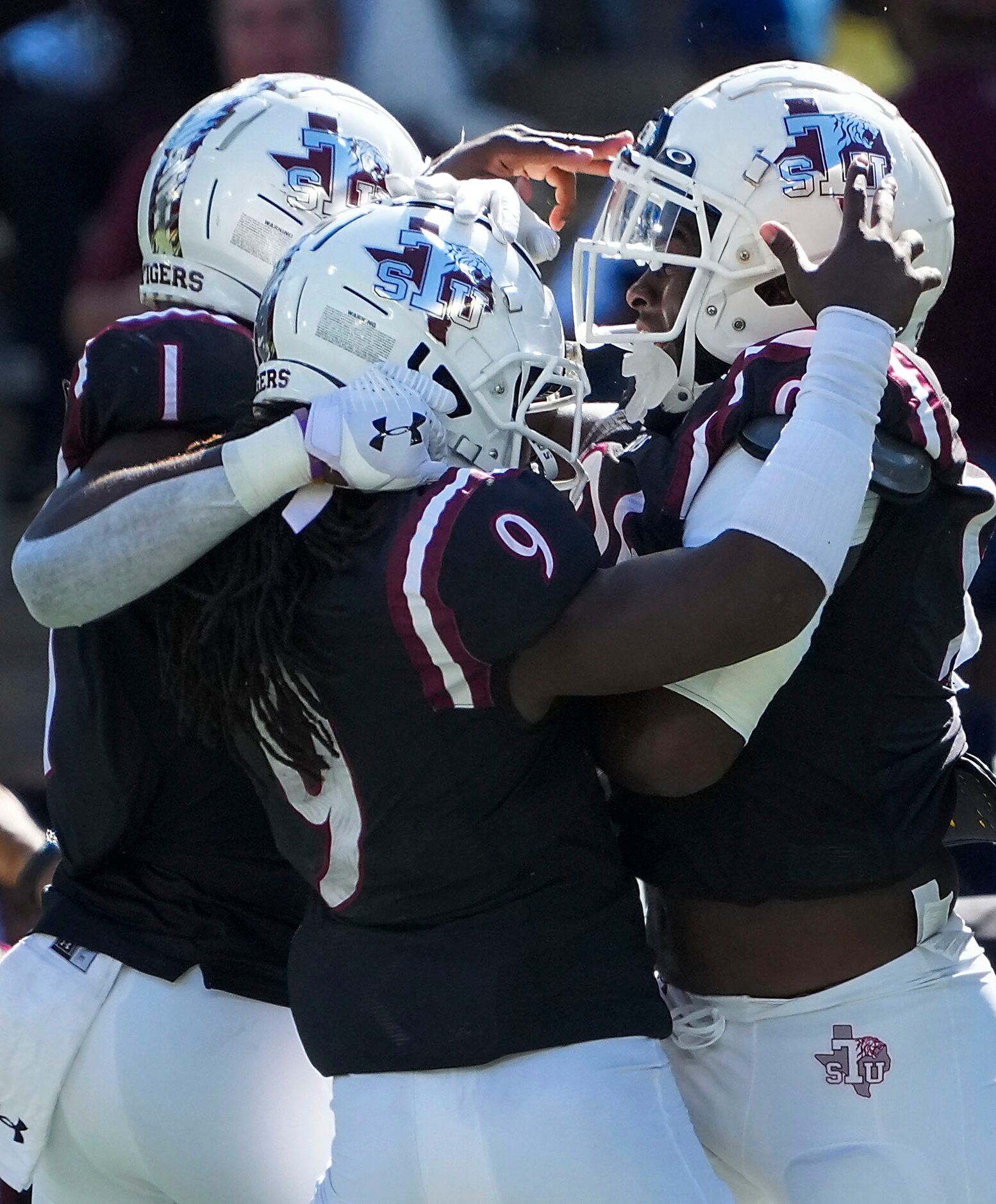 TSU cornerback Cedrick Williams (9) celebrates a Southern turnover with safety Raheme Fuller...