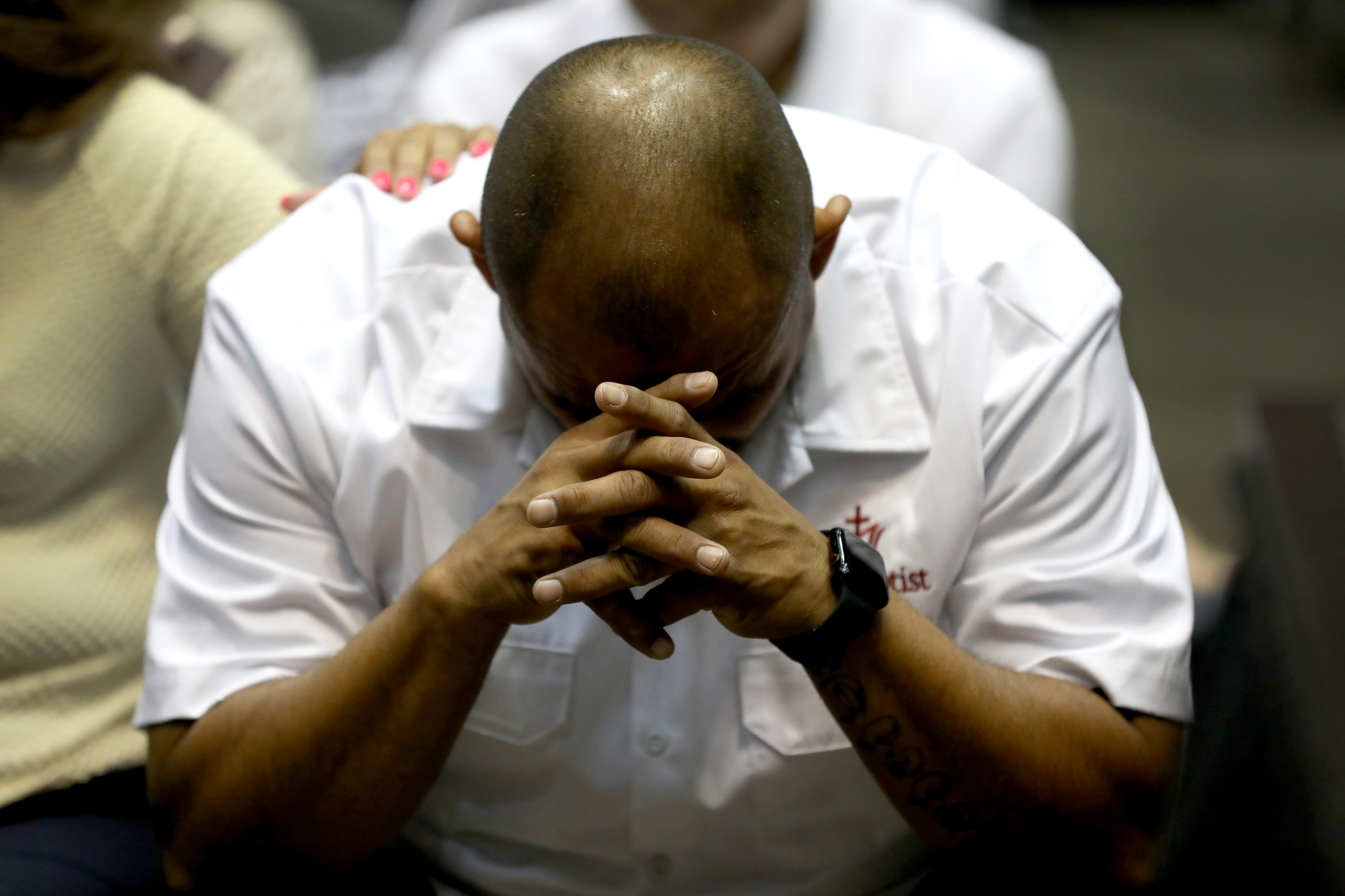 First Baptist Church members participate in Sunday service held at the Dallas Convention...