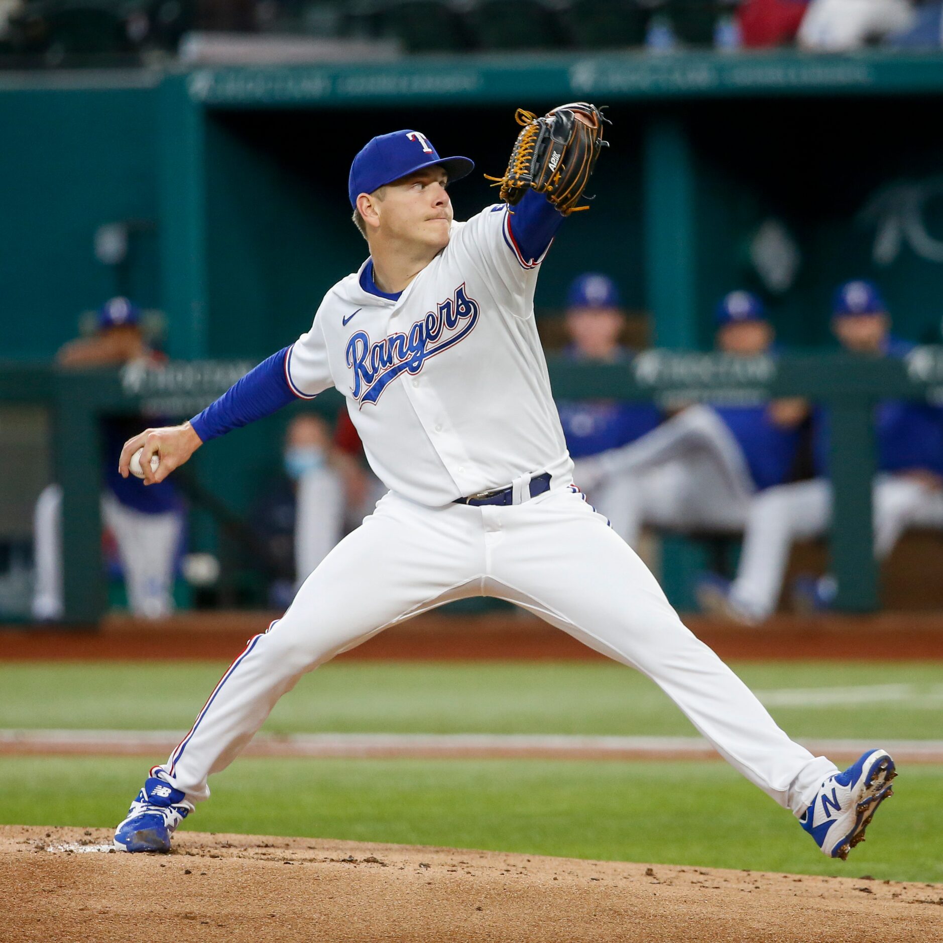 Texas Rangers starting pitcher Spencer Howard (31) delivers a pitch during the first inning...