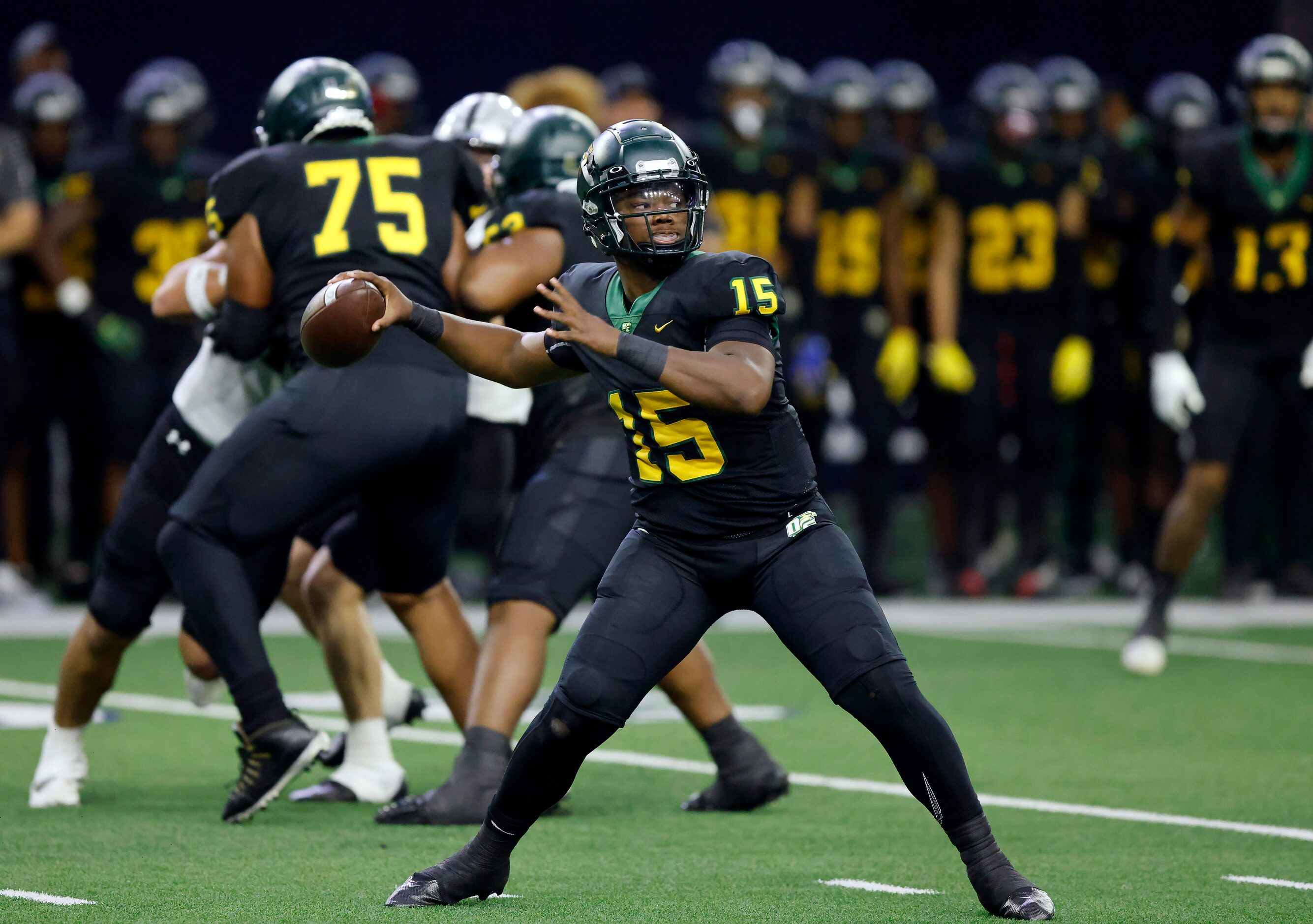 DeSoto quarterback Darius Bailey (15) throws a first half pass against the Denton Guyer...