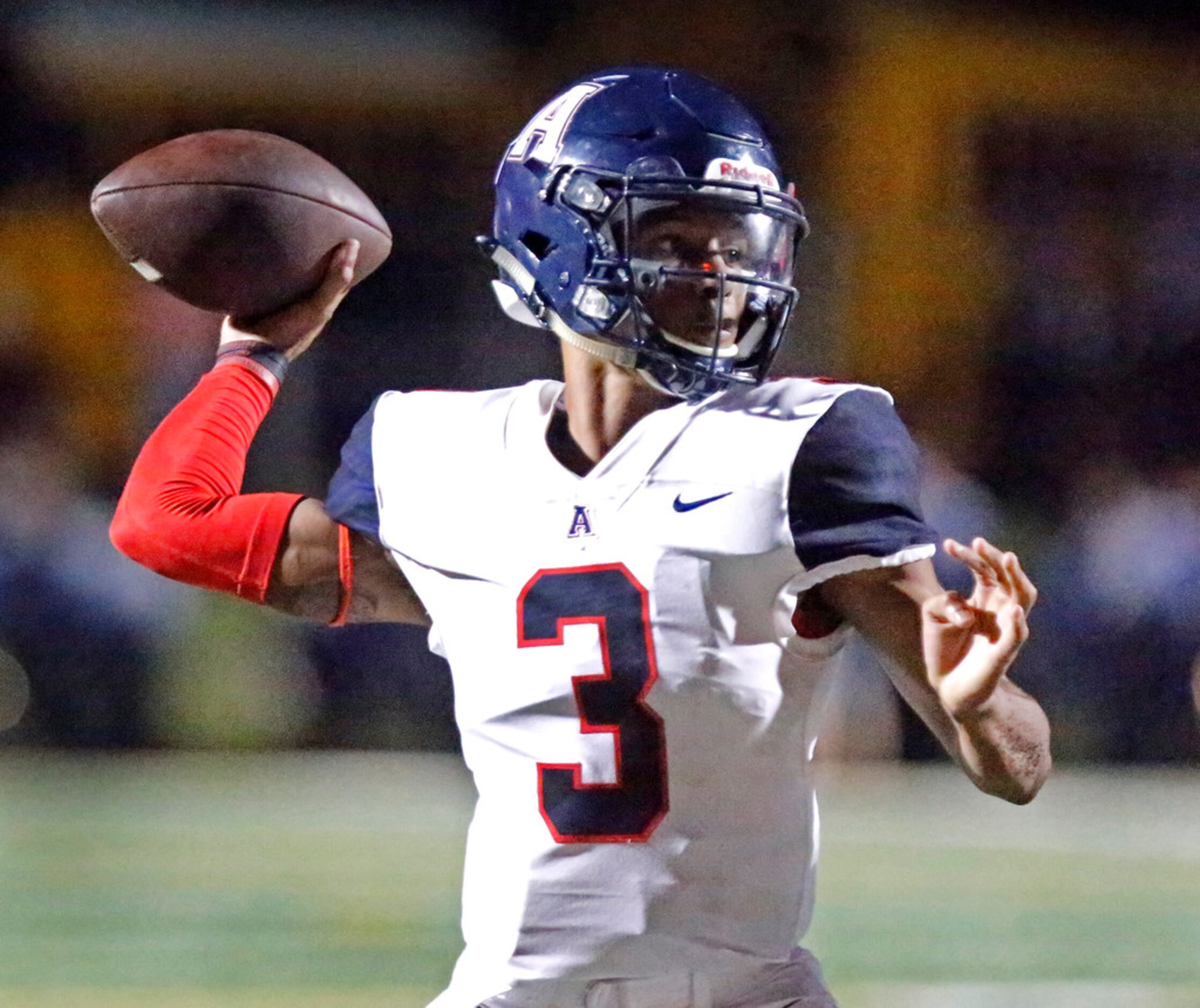 Allen High School quarterback Raylen Sharpe (3) throws a pass during the first half as Plano...