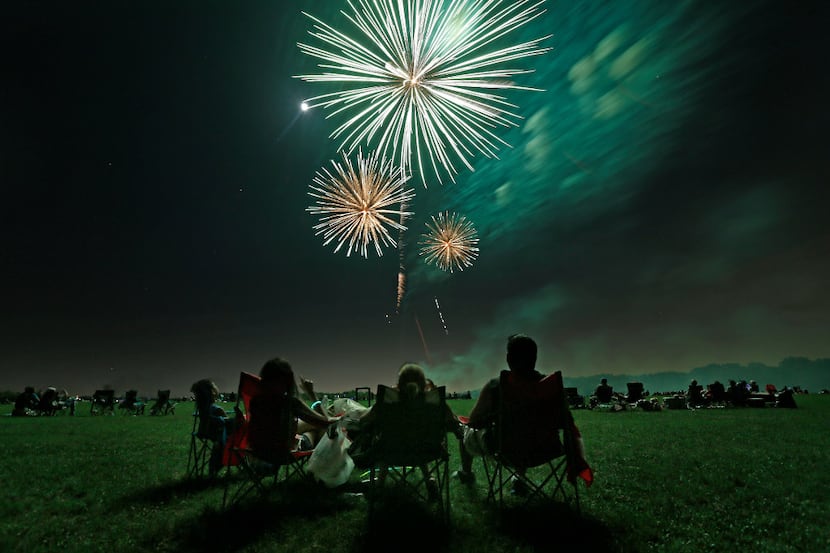 Fireworks explode over Breckinridge Park in Richardson, Texas, Tuesday, July 4, 2017.