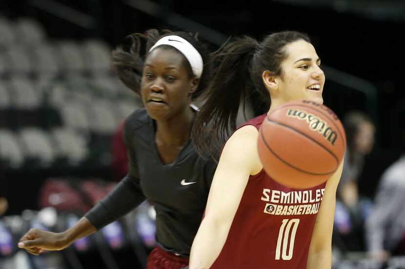 Florida State players Leticia Romero (10) and Adut Bulgak practice at American Airlines...
