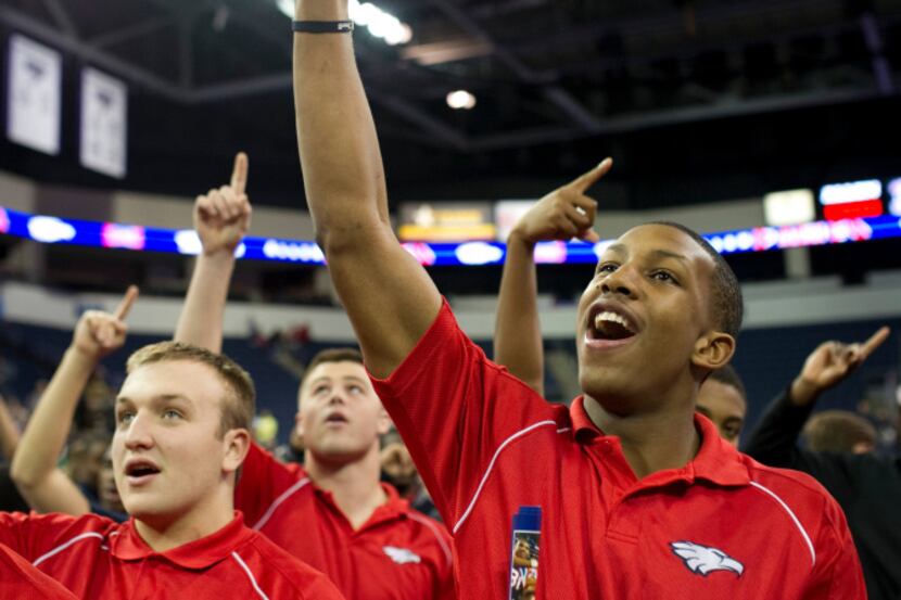 Tay Evans celebrates during Allen High School's football state championship community...