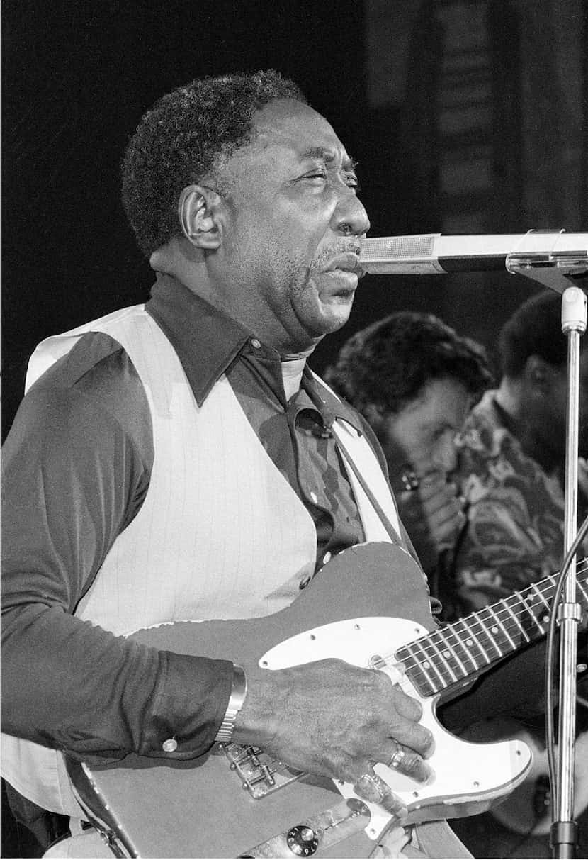 Blues musician Muddy Waters performs at New York's Palladium Theater, Oct. 1, 1977 in a...