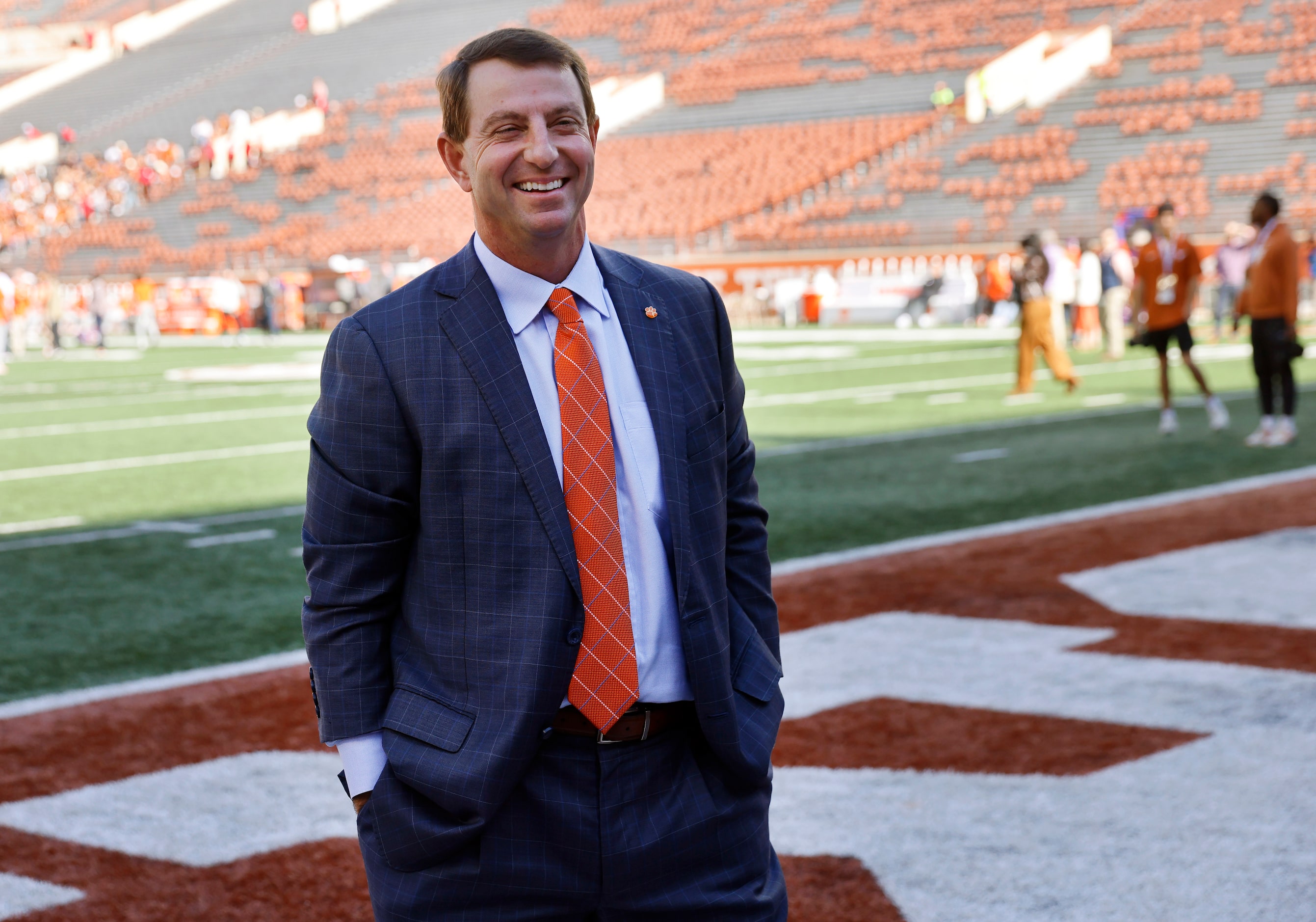 Clemson Tigers head coach Dabo Swinney walks around the field before the CFP first round...