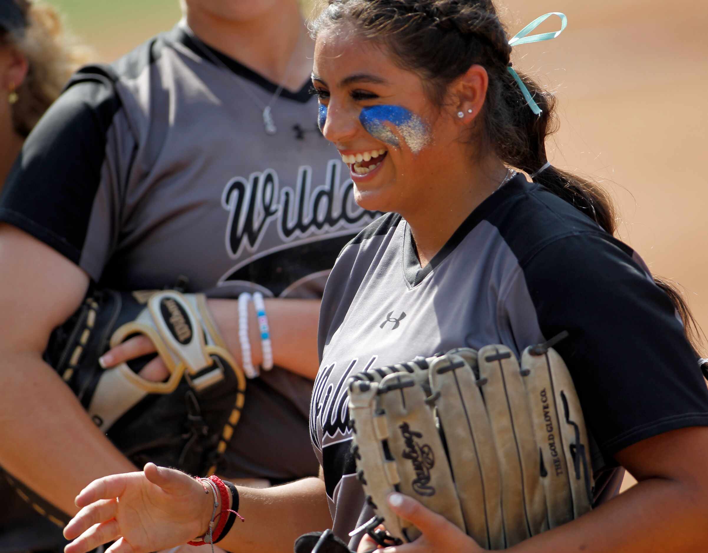 Denton Guyer pitcher Jenny Robledo (5) was all smiles after retiring the final Pearland...