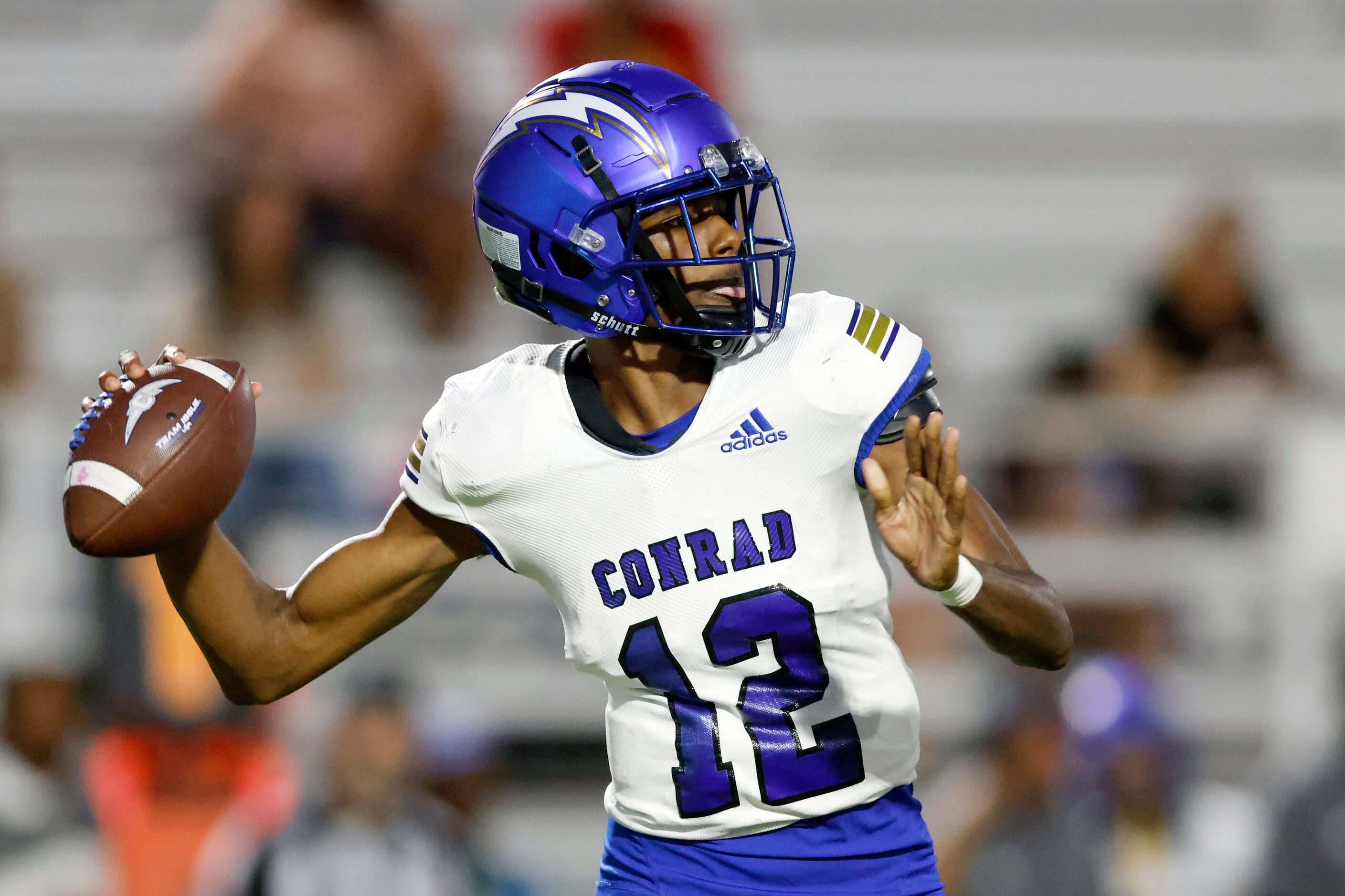 Conrad quarterback Ladavian Frost-Harris (12) drops back to throw a pass during the first...