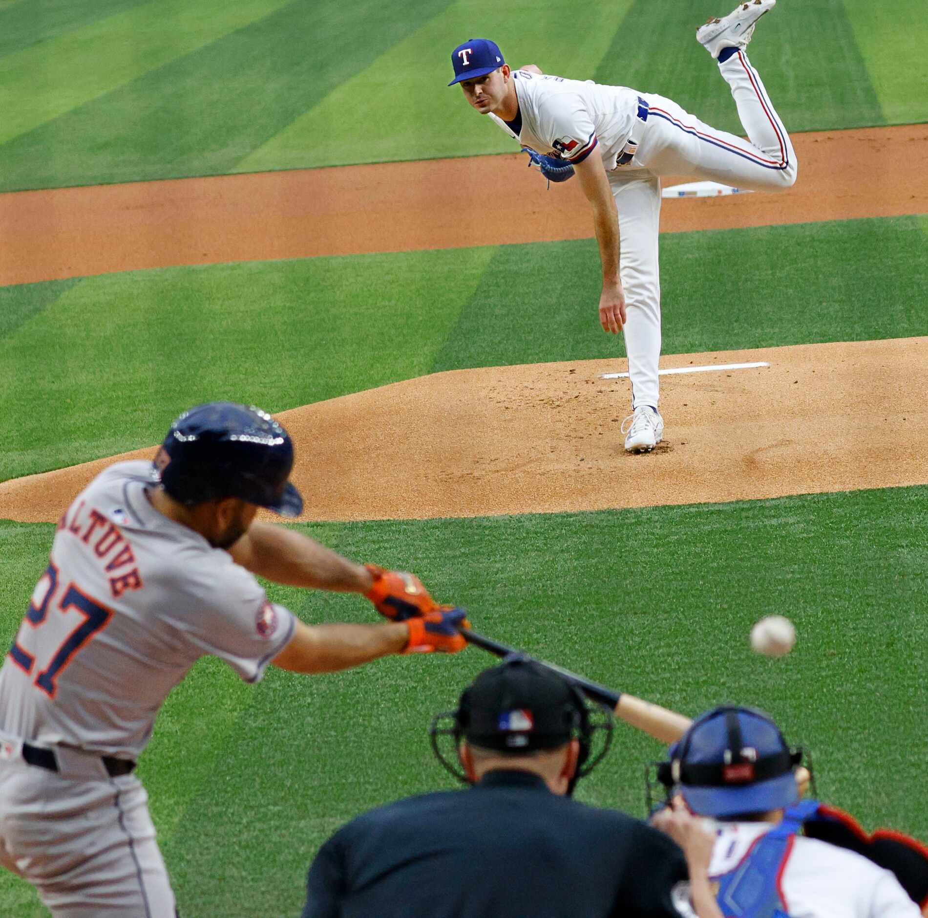Texas Rangers pitcher Cody Bradford (61) delivers to Houston Astros second base Jose Altuve...