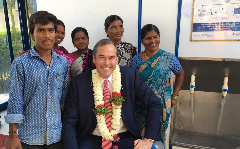 Ray Washburne visits a WaterHealth machine in India.