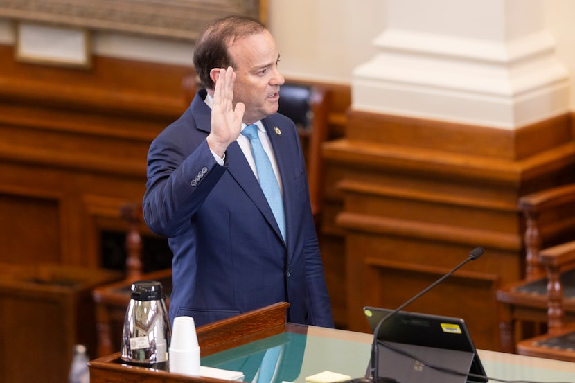 Grant Dorfman, deputy first assistant attorney general, is sworn in to provide testimony...