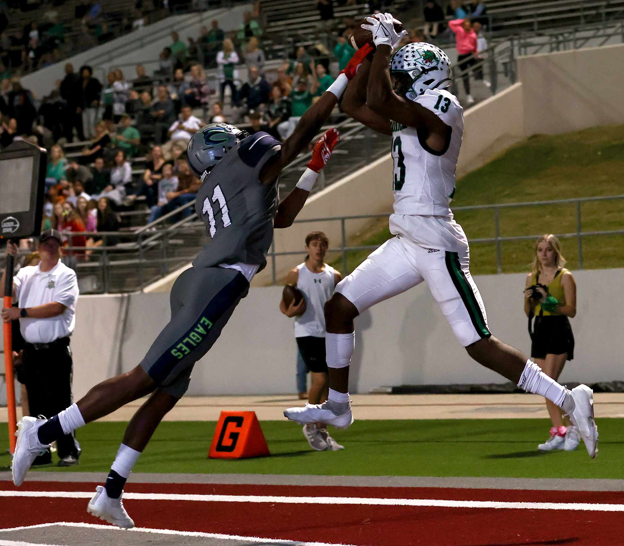 Southlake Carroll wide receiver RJ Maryland (13) tries to come up with a reception against...
