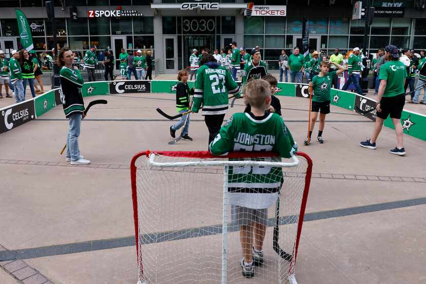 Dallas Stars fans play hockey at PNC Plaza before Game 1 of the NHL hockey Western...