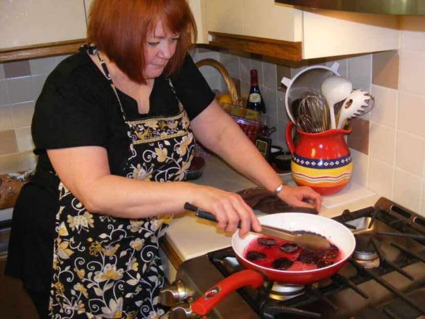 
Far North Dallas resident Donna Thomas prepares roasted beet Napoleons with raspberry...