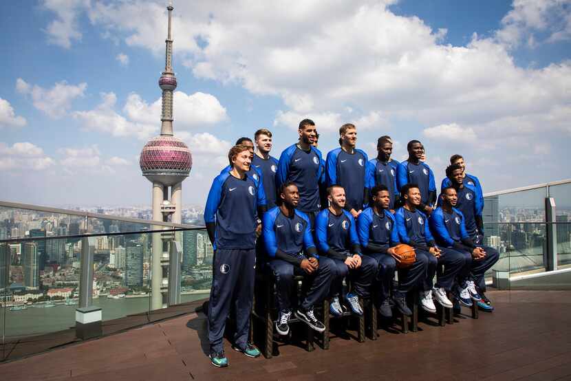 Dallas Mavericks player gather for a team photo atop their hotel on Thursday, Oct. 4, 2018,...