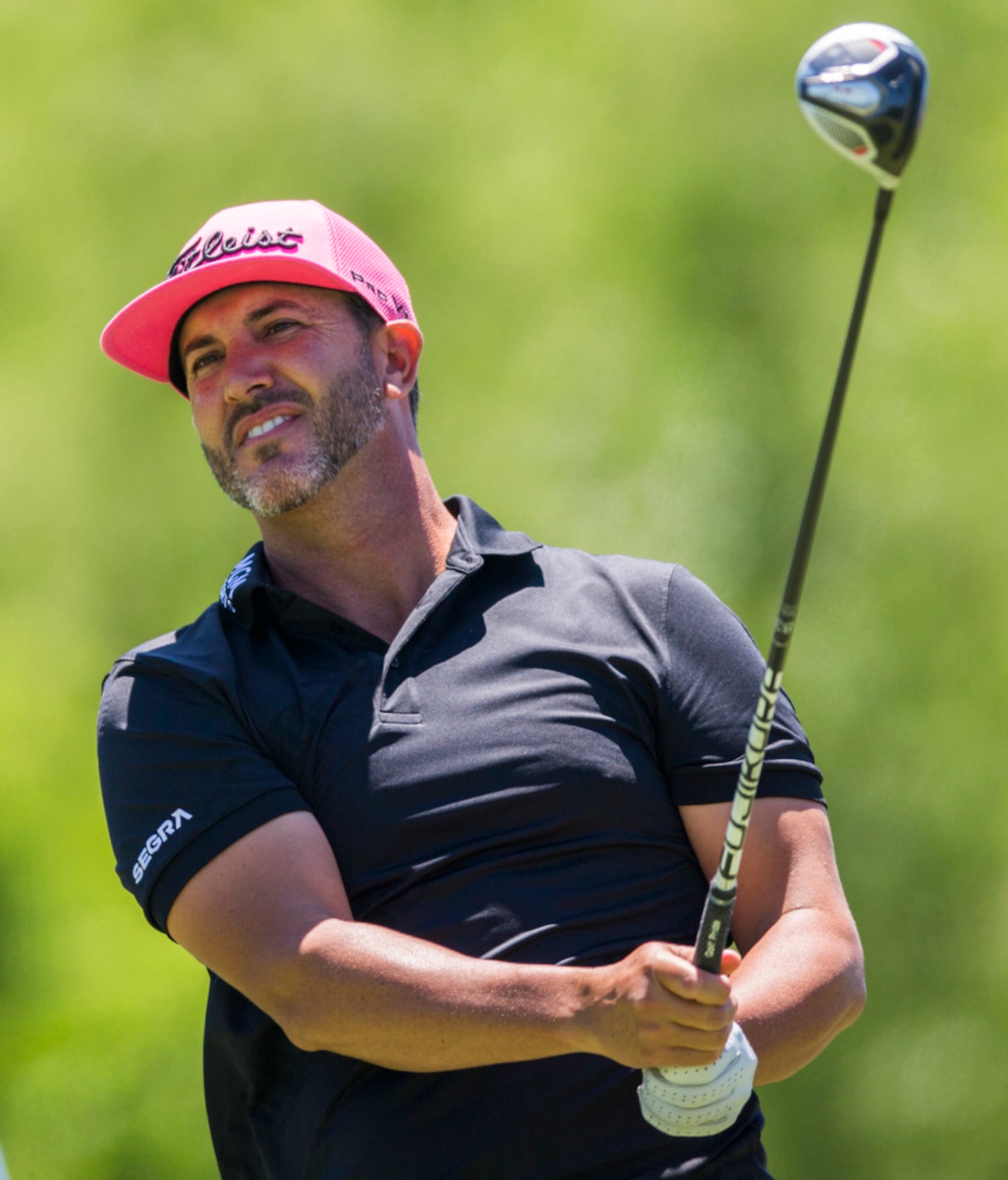 Scott Piercy tees off at hole 4 during round 4 of the AT&T Byron Nelson golf tournament on...