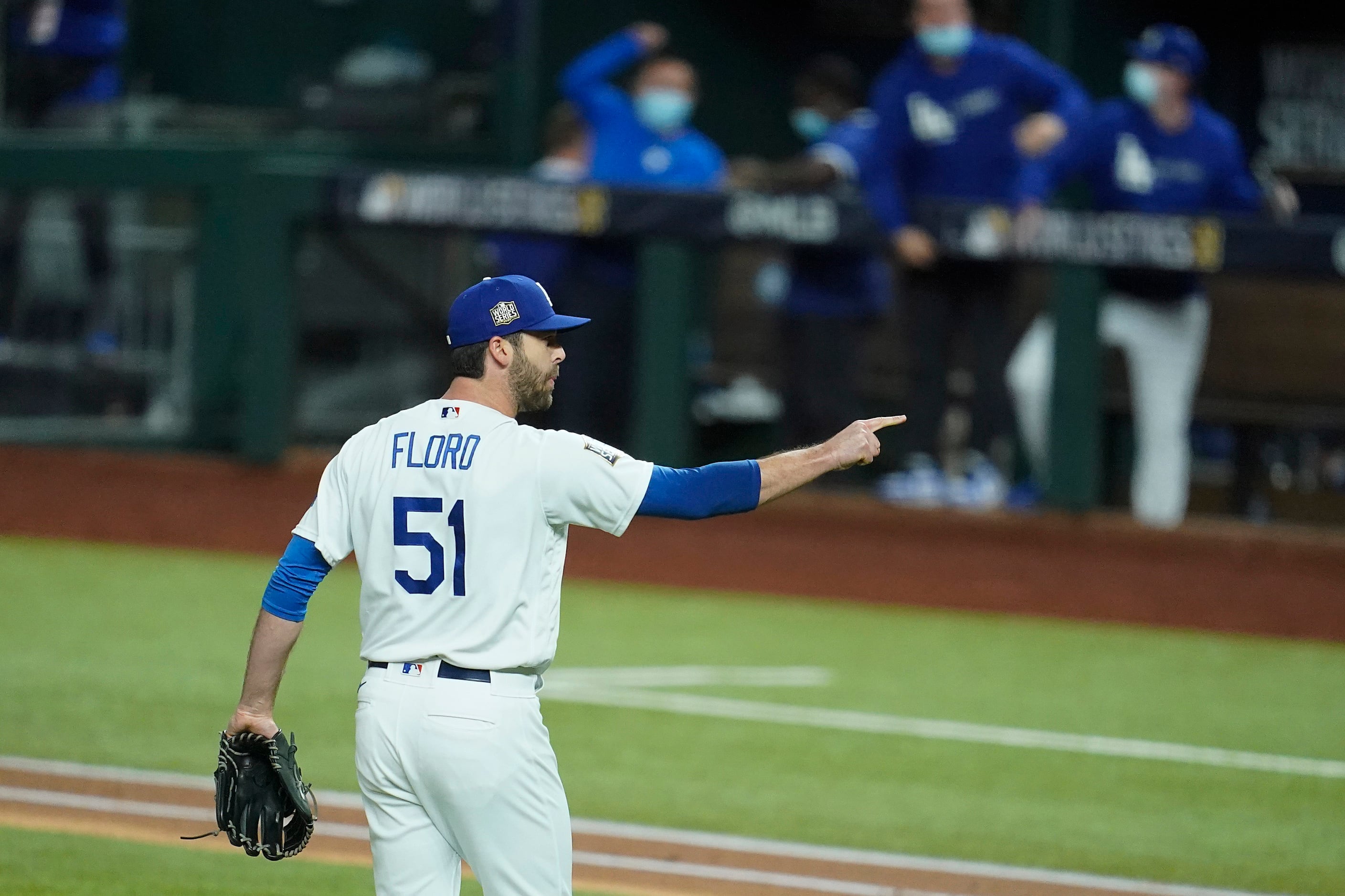 Los Angeles Dodgers relief pitcher Dylan Floro reacts after striking out Tampa Bay Rays left...