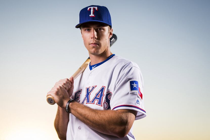 Texas Rangers outfielder Ryan Cordell photographed during spring training photo day at the...
