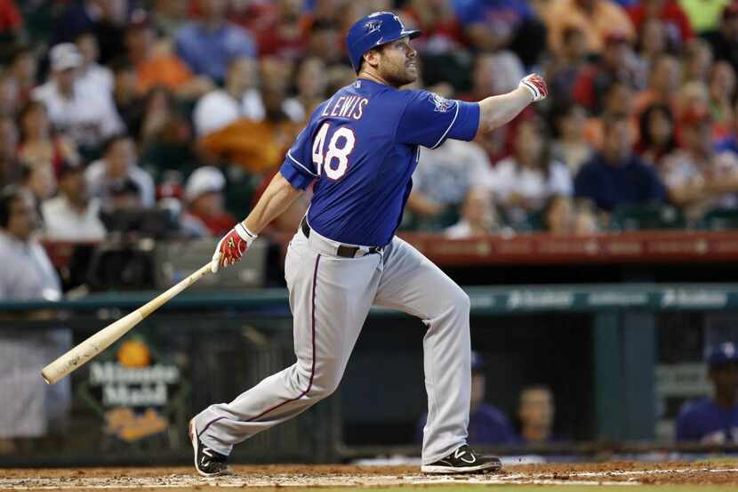 May 20, 2012; Houston, TX, USA; Texas Rangers starting pitcher Colby Lewis (48) hits a...