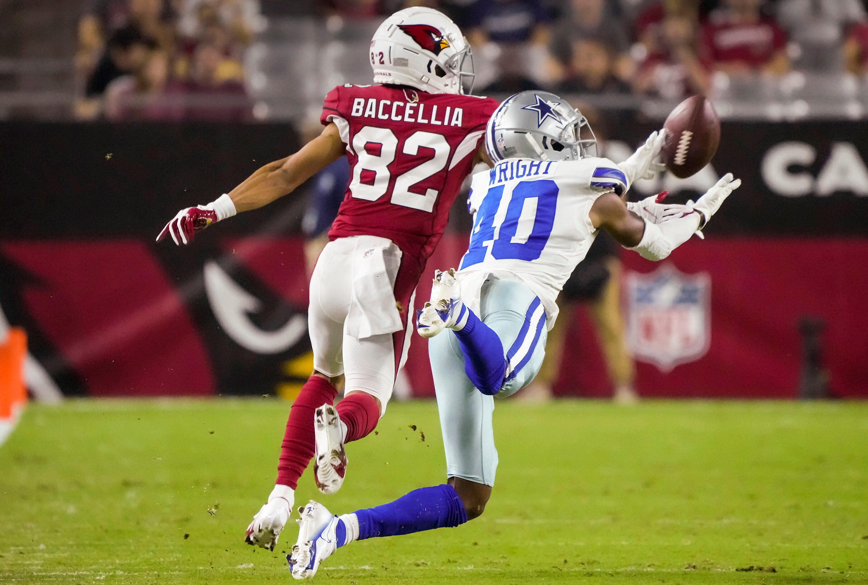 Dallas Cowboys cornerback Nahshon Wright (40) breaks up a pass intended for Arizona...